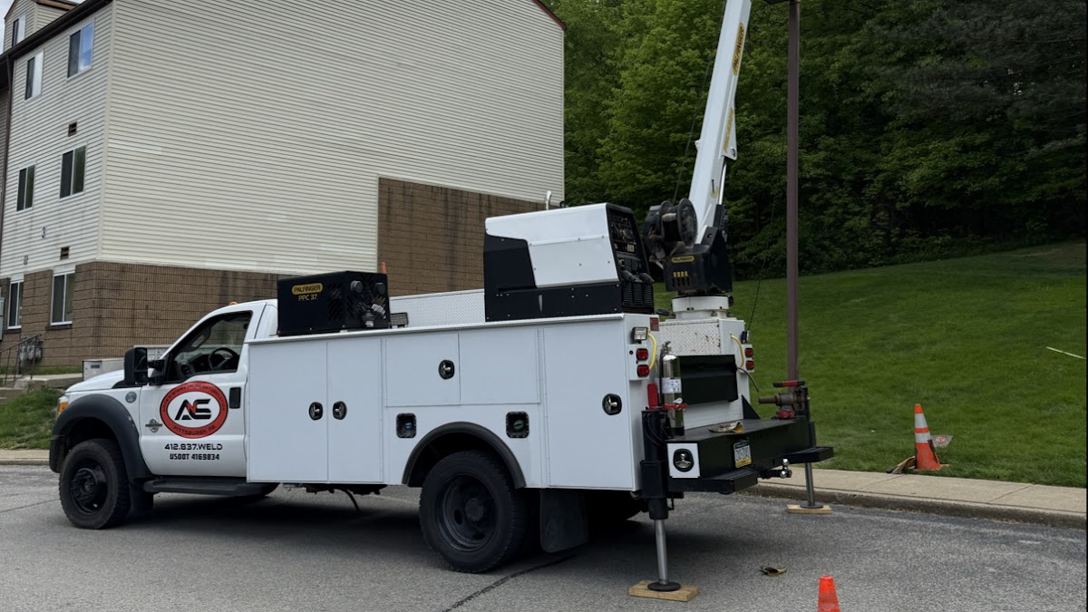 A'n'S Welding's own branded service truck with a boom crane and mounted welding rig